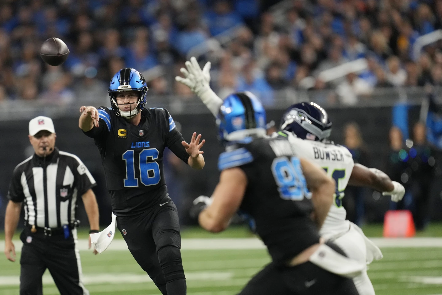 Jared Goff breaks an NFL record by completing all 18 of his passes in the Detroit Lions’ 42-29 victory against the Seattle Seahawks