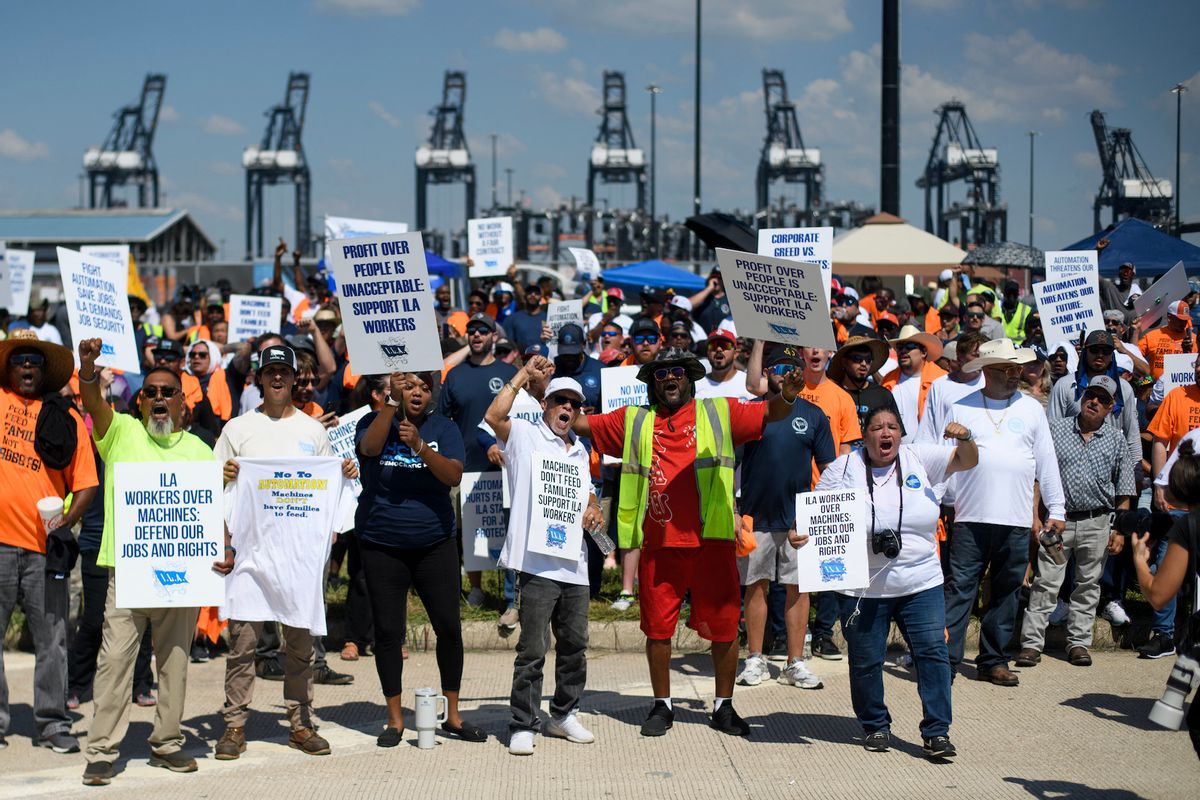 Longshoremen suspend strike, win raises