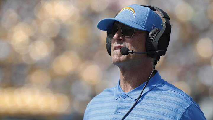 Jim Harbaugh briefly exits Chargers-Broncos with illness