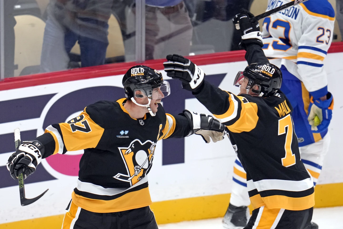 Crosby and Malkin guide the Pittsburgh Penguins to a 6-5 overtime victory over the Buffalo Sabres, marking a memorable night