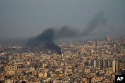 Israeli airstrikes hit Beirut suburbs